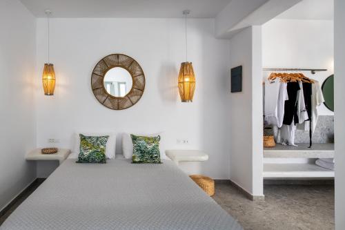 Postel nebo postele na pokoji v ubytování Seven Suites