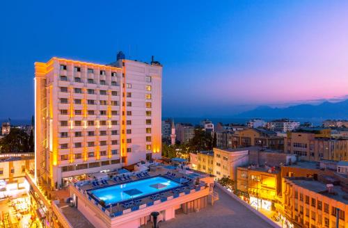 a large building with a large clock tower at Best Western Plus Khan Hotel in Antalya