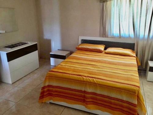 Cama o camas de una habitación en Altagracia Apartments Santo Domingo