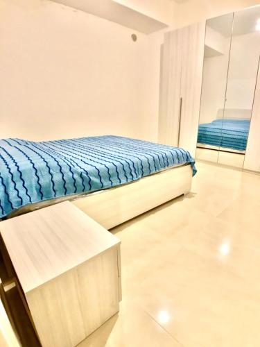 Una cama o camas en una habitación de Terrazza sul mare Pisciotta - Palinuro