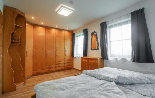 Postel nebo postele na pokoji v ubytování Ferienwohnung In Techelsberg