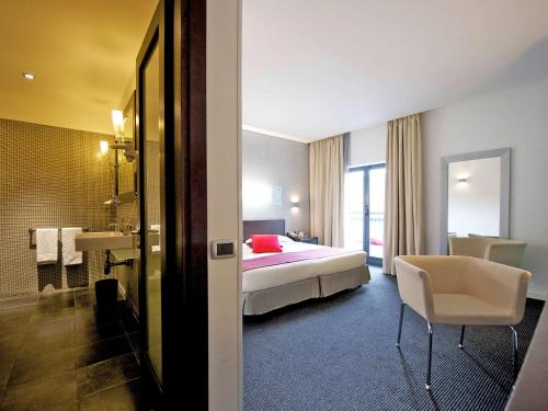 Postel nebo postele na pokoji v ubytování Mercure Palermo Centro