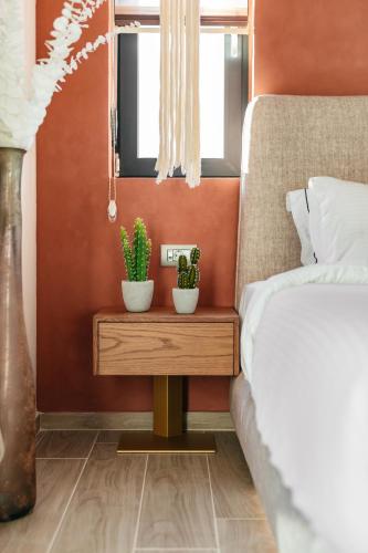 Katil atau katil-katil dalam bilik di Cocooning Suites by Blue Carpet