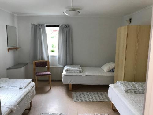 Postel nebo postele na pokoji v ubytování Vandrarhem Varvet