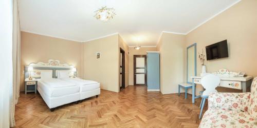 Кровать или кровати в номере Wolkendorf Bio Hotel & Spa