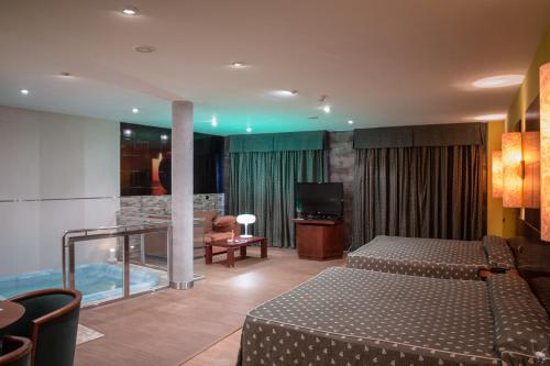Posteľ alebo postele v izbe v ubytovaní Motel Emporio