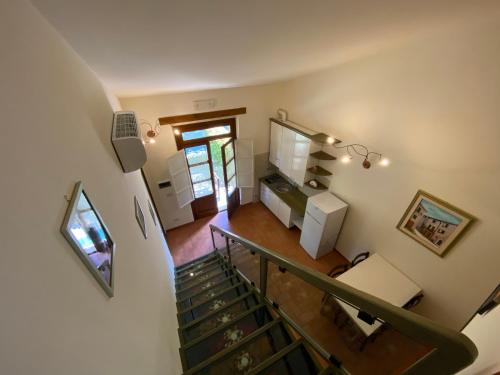 an overhead view of a staircase in a house at Agriturismo Tenuta Badia in Paciano