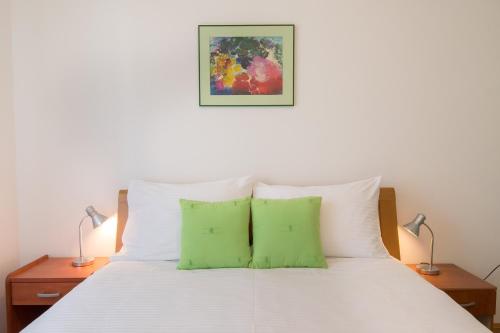 Posteľ alebo postele v izbe v ubytovaní Apartments Palmic