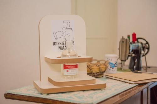 a kitchen counter with a stand mixer on a table at B&B Sa domo de sos Massaios in Orosei