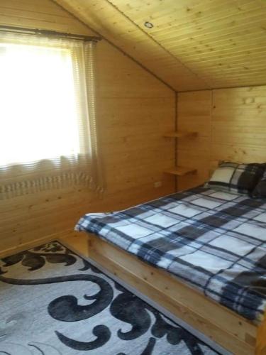 Una cama o camas en una habitación de У Мар'яни