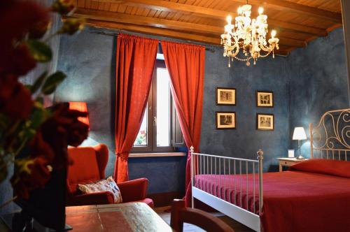 Ein Bett oder Betten in einem Zimmer der Unterkunft Il Viaggiatore