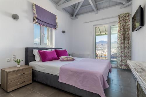 Łóżko lub łóżka w pokoju w obiekcie Villa Myli - Skopelos