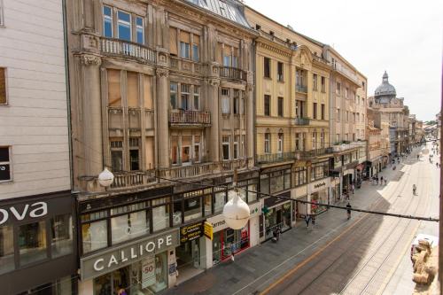 an empty street in a city with buildings at Timeout Heritage Hotel Zagreb in Zagreb