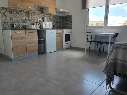 Cucina o angolo cottura di Valentinos Apartments