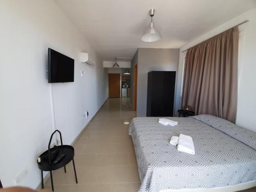 Letto o letti in una camera di Valentinos Apartments