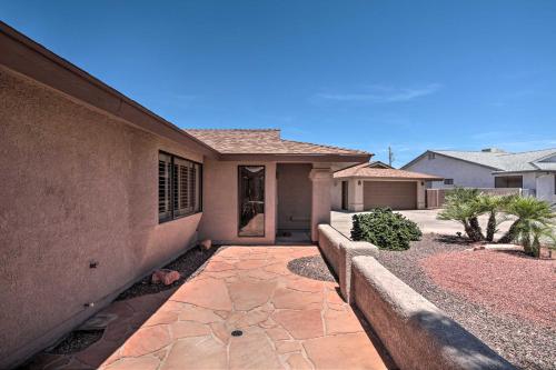 a house with a walkway in front of it at Heated Pool, Spa and Mtn Views Lake Havasu Home! in Lake Havasu City