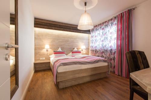 Postel nebo postele na pokoji v ubytování Hotel Nuhnetal