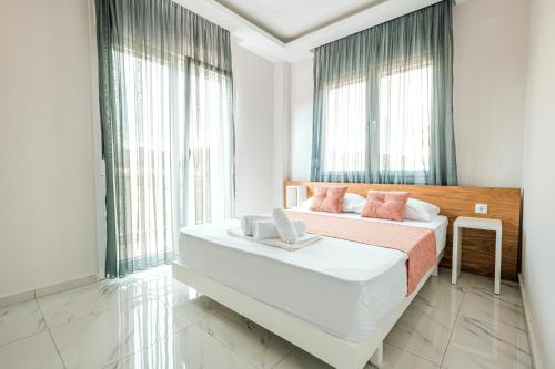 Posteľ alebo postele v izbe v ubytovaní Design Suites Efharis (Brusco)