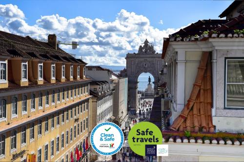 a view of a city with buildings and a bridge at My Story Hotel Augusta in Lisbon