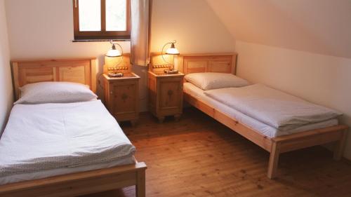 Postel nebo postele na pokoji v ubytování Doubický Venkov