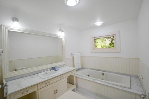 Ванна кімната в Villa Coração