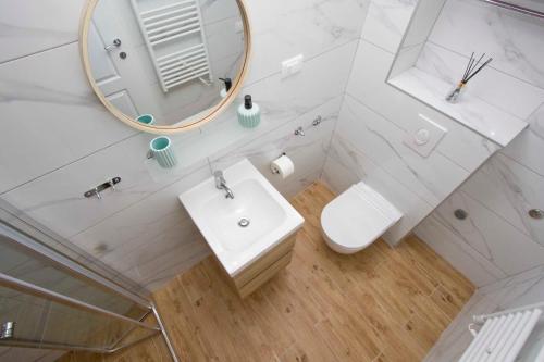 Koupelna v ubytování Apartmani Rustica