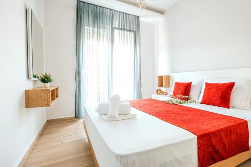 Postel nebo postele na pokoji v ubytování Design Suites Efharis (Merlot)