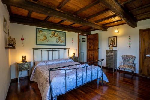 เตียงในห้องที่ Villa Rustica Le Piagge