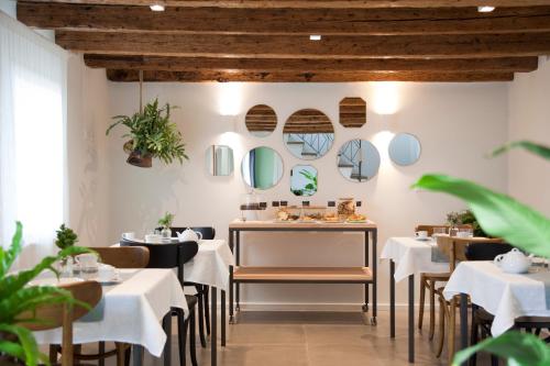 Reštaurácia alebo iné gastronomické zariadenie v ubytovaní Agriturismo Basegò
