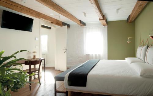 Posteľ alebo postele v izbe v ubytovaní Agriturismo Basegò