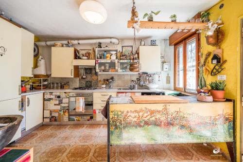 Kuchyň nebo kuchyňský kout v ubytování Selvatica50 b&b