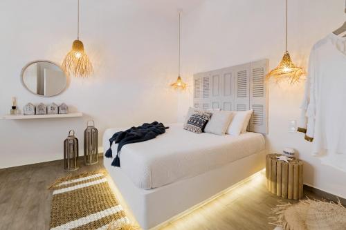 Postel nebo postele na pokoji v ubytování Menori Luxury Suite
