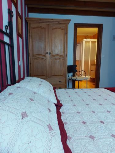 Cama o camas de una habitación en Casa de Labranza Ría de Castellanos