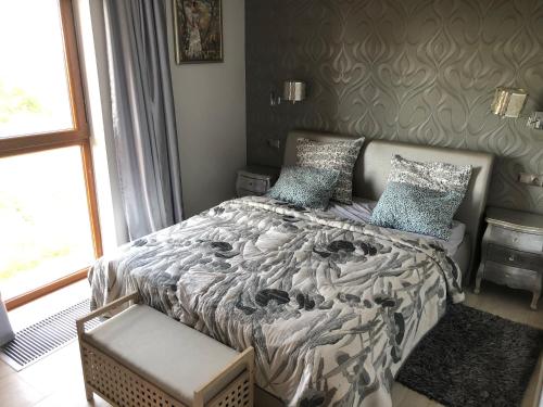 Postel nebo postele na pokoji v ubytování APARTAMENT DRUGIE PIĘTRO