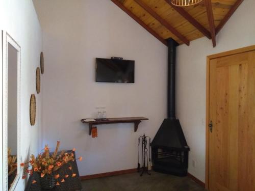 Una televisión o centro de entretenimiento en Chalés Lanelli