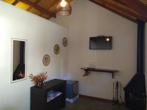 Una televisión o centro de entretenimiento en Chalés Lanelli