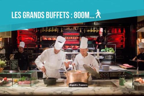two chefs are preparing food in a kitchen at L'Exotique Narbonnais in Narbonne