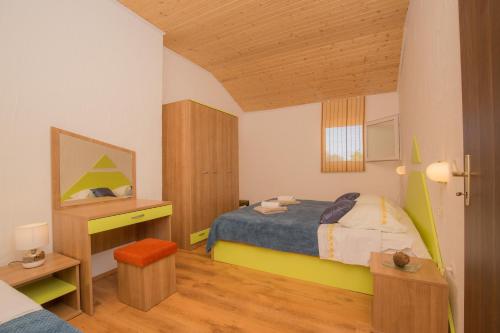 Ένα ή περισσότερα κρεβάτια σε δωμάτιο στο Holiday House El Dorado!!