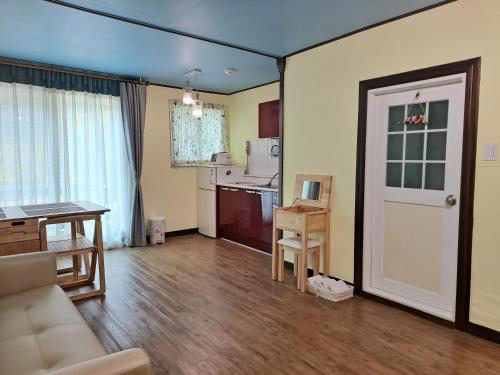 Kuchyň nebo kuchyňský kout v ubytování Charm Pension