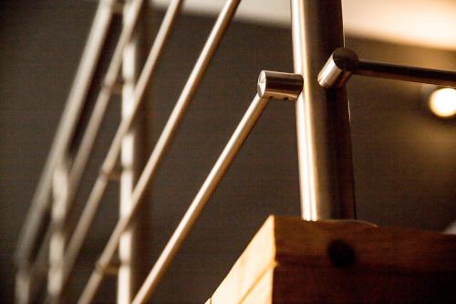 a close up of a metal railing of a bridge at "Here" Mini loft Alghero in Alghero