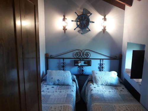 Postel nebo postele na pokoji v ubytování La Casina de Abo