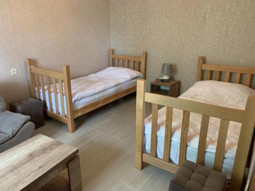 Postel nebo postele na pokoji v ubytování Hotel SHIBI