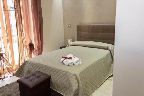 Postel nebo postele na pokoji v ubytování Residenza Montenevoso