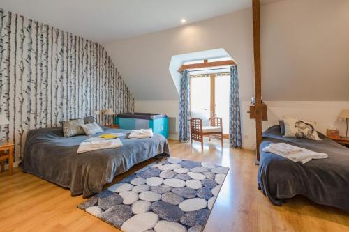 Postel nebo postele na pokoji v ubytování Normandy Inn