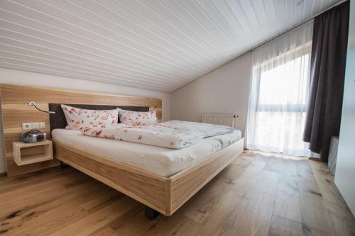 See genießen - Haus Seehang tesisinde bir odada yatak veya yataklar