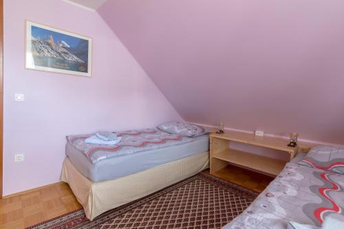 Postel nebo postele na pokoji v ubytování Apartment Jakovc