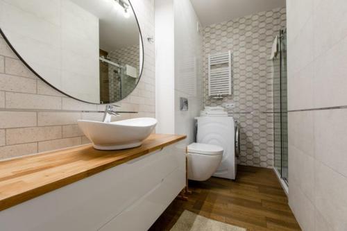 Koupelna v ubytování Resort Apartamenty Klifowa Rewal 36