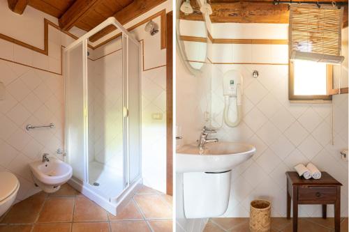 a bathroom with a shower and a sink and a toilet at Solemar Sicilia - Le Casette Di Calzata in Campofelice di Roccella