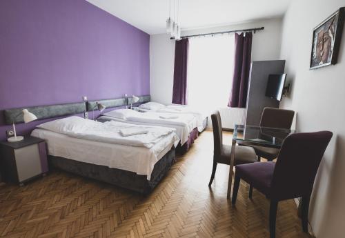 Cybulskiego Guest Roomsにあるベッド