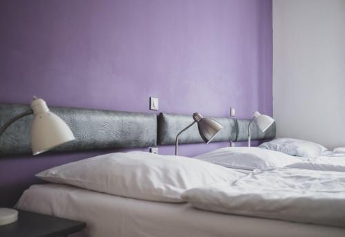 Cybulskiego Guest Roomsにあるベッド